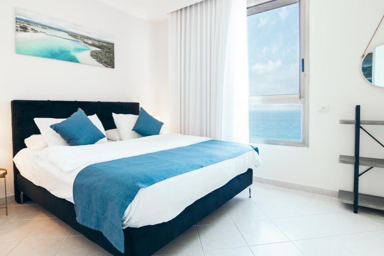 Almog Beach Apartments מגדלי חוף הכרמל חיפה Extérieur photo